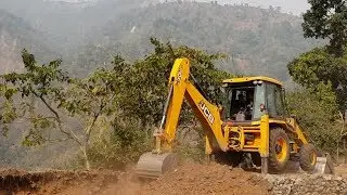 JCB Backhoe-Leveling Hilly Dusty Road-Jubilant Villagers