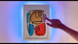 Painting with a mood light that matches any colour you touch on the art