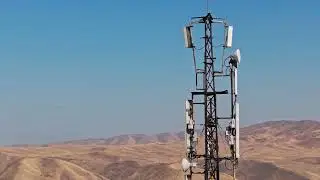 telecom cellphone tower in rural Kyrgyzstan at dry autumn day