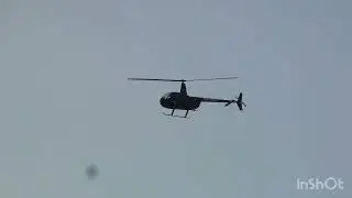 @BeckiandChris &lsquo;s Robinson R44 Raven II N300WZ Flying Over KBUF