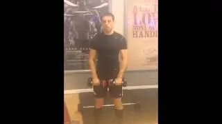 front raises DB - Oval Personal Trainer
