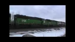 Three BN Casecade Green SD60M's and an Executive SD70MAC grinding upgrade in Notch 8