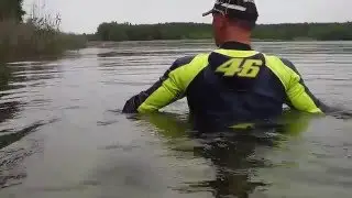 swimming with vr46 valentino rossi bikesuit in a lake part 1