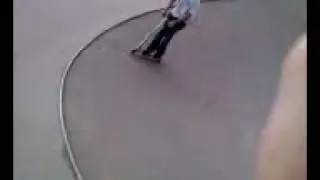 Tanner scootering with a scooter