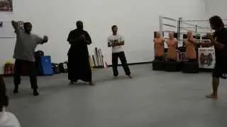 Master Liban teaching Knife Fighting to Pinakatay, 12 Pu&ntilde;al Palo of Yaw-Yan Fervilleon. 10/22/13.