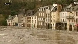 Western France and Britain raked by storms and flooding
