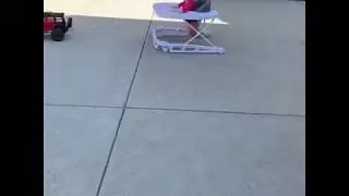 While dad is on duty- Rc car pulling baby walker