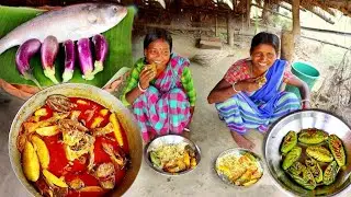 Hilsha fis with brinjal curry cooking&eating by santali tribe women||rural village India