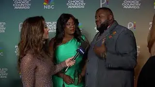 The War and Treaty talks People's Choice Country Awards on Blue Carpet