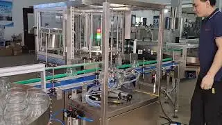 Candle wick inserting machine
