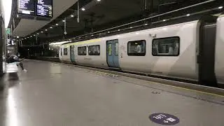 Thameslink class 700 one arriving and one leaving St Pancras Station  23 August 2021.