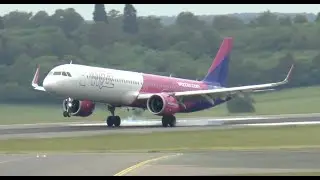 Wizzair Airbus A321 London-Luton airport landing - Terminal Car Parking 2 view