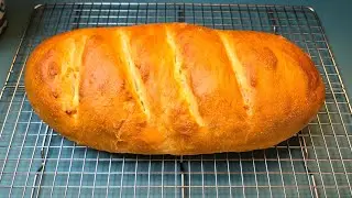 Homemade classic Italian bread with a chewy crust and soft - fluffy interior