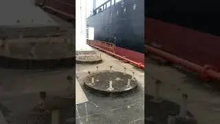 Oil tanker unloading oil at mooring station.