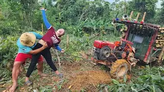 girl driving agricultural vehicle transporting wood