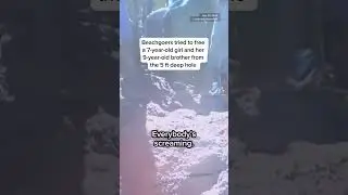 Two kids trapped in sand hole while playing on the beach