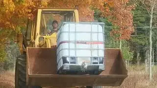 Neighbors Coming For Water Country Style  #backhoe #heavyequipment #masseyferguson #countrystyle 