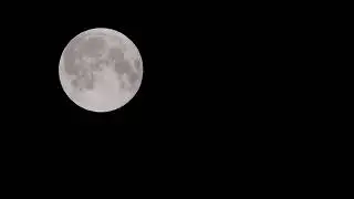 Moon on the horizon in Kolding