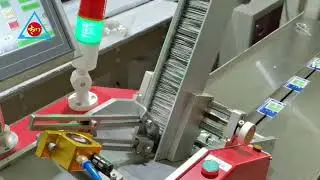 Card packaging machine.Auto feeding system.