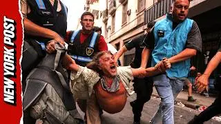 Explosive Clashes in Argentina as Police Fire Tear Gas at Labor Reform Protesters