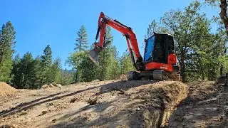 Excavating how to drains and grading with the Kubota KX 040 4 excavator