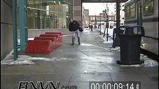 12/22/2003 People walking on slippery sidewalk video.