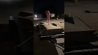 Daughter inspecting 50&rdquo; wide walnut slabs 22ft long