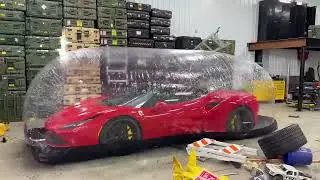 Testing the safety & security on an inflatable car storage by WhistlinDiesel.