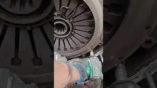 The process of dismantling clutch plates on a large truck