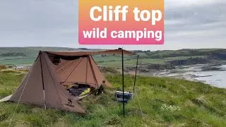 Wild camping Scotland. Clifftop camp. Campfire cooking peri peri chicken. Outdoors on the West coast