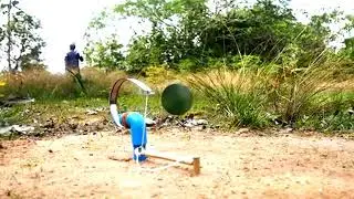 Primitive technology Walking to trap pigeons using a saw and blue PVC