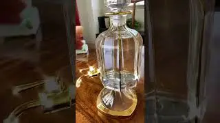 Oud oil glass decanter bottle with Faucet .