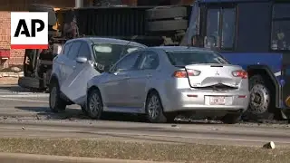 Vehicle crashes into school bus in police pursuit  in Milwaukee