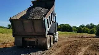 Tailgating shale on a new driveway