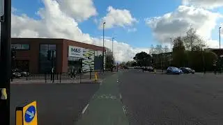 Blue Car : Drives over curb and then towards me