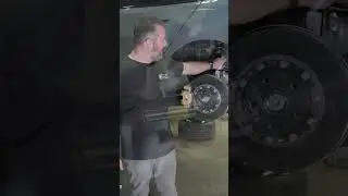 On these G90 M5s, the rear spring install requires disassembling interior pieces for access