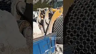 Cat 988B Loading Massive Marble Blocks to Truck