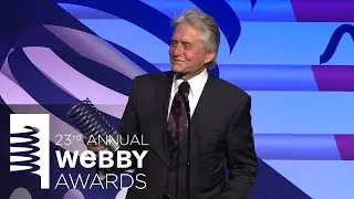 Sarah Baker presents Michael Douglas with a Special Achievement at the 23rd Annual Webby Awards