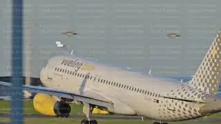 Plane Landing at Lisbon Airport During Sunset with Tire Smoke