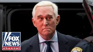 Roger Stone speaks to the media