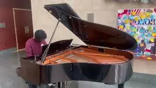 St. Louis nursing student Nicholas Murphy plays piano in school lobby | St. Louis Magazine