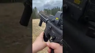 Airsoft M4 with holographic sight