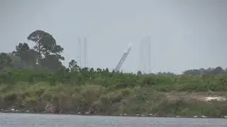 A SpaceX Falcon 9 goes upright at pad 40 ahead of Transporter 4 launch