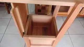 Cadeira que vira mesa de passar roupas