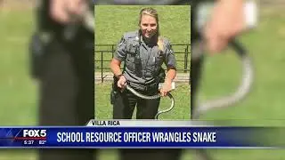 Villa Rica school resource officer wrangles snake