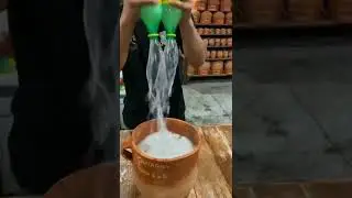 Giant Cantarito cocktail prepared at el G&uuml;ero