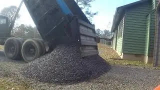 Kubota Skidsteer Spreading Gravel
