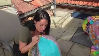 KE 011 spitting in beach balls
