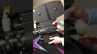 Detaching the 400ft mag on a Canon Scoopic