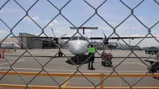 Dash 8 Q300 taxi to gate and shut down